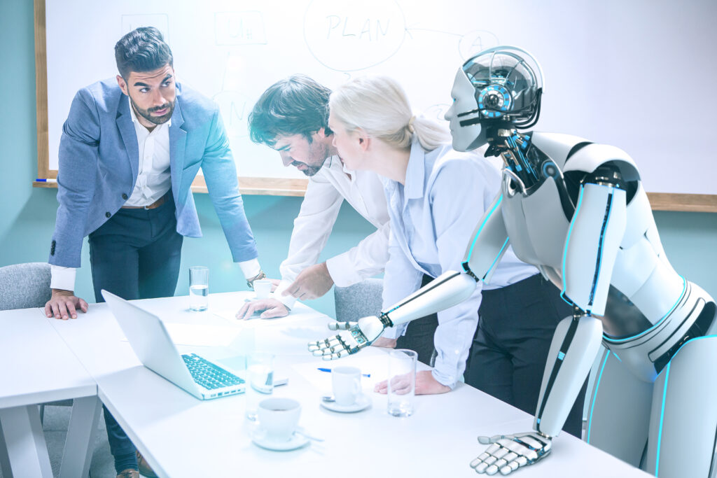 Businesspeople working with humanoid robot in office